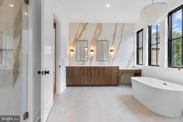 913 Drexel Ln, Bryn Mawr, PA 19010 - full bath featuring double vanity, a freestanding tub, and recessed lighting