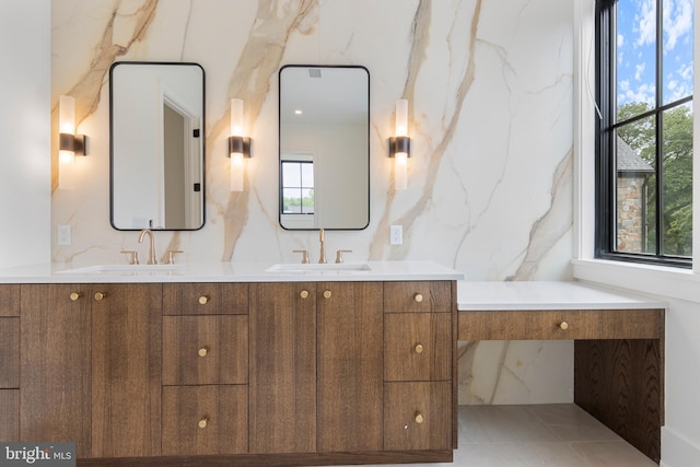913 Drexel Ln, Bryn Mawr, PA 19010 - full bath featuring healthy amount of natural light and double vanity