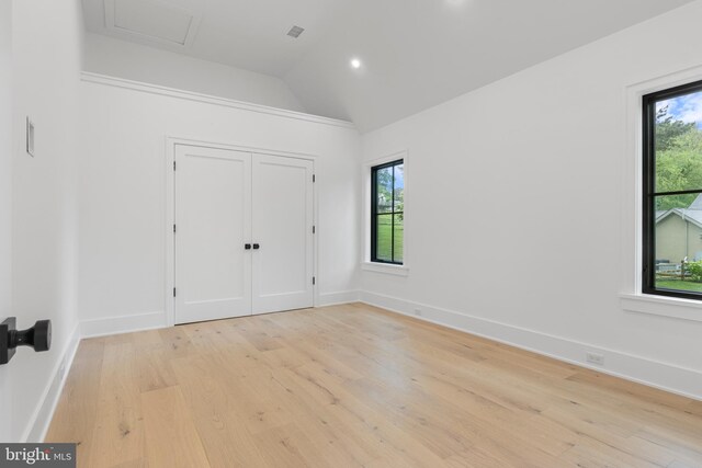 913 Drexel Ln, Bryn Mawr, PA 19010 - unfurnished bedroom with light wood-type flooring, vaulted ceiling, baseboards, recessed lighting, and a closet