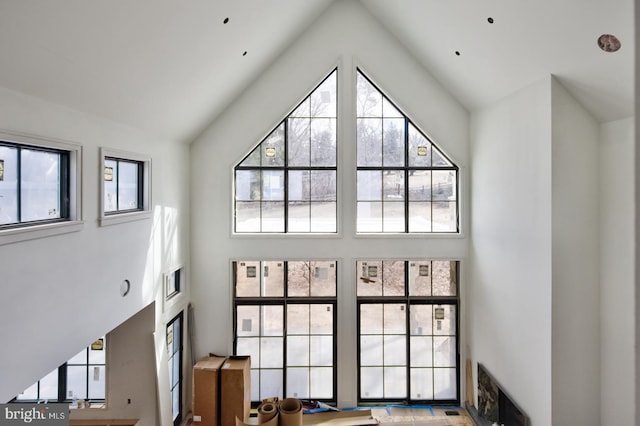 913 Drexel Ln, Bryn Mawr, PA 19010 - unfurnished living room featuring high vaulted ceiling and a glass covered fireplace