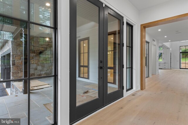 913 Drexel Ln, Bryn Mawr, PA 19010 - doorway to outside with french doors, wood finished floors, and recessed lighting