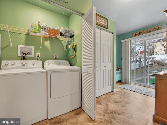 laundry area with separate washer and dryer