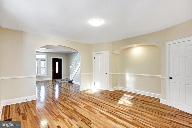 foyer with hardwood / wood-style flooring