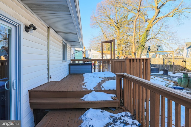 view of snow covered deck