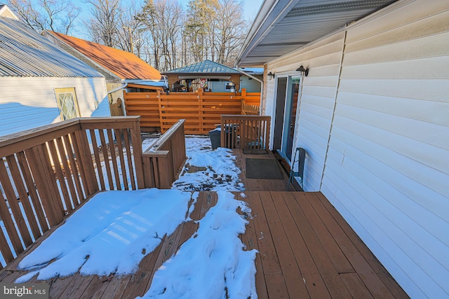 view of snow covered deck