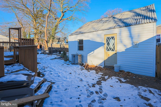 view of snow covered property