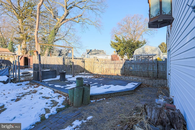 view of yard covered in snow