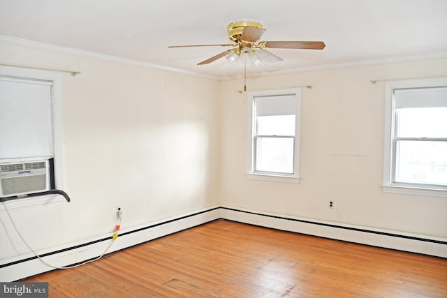 spare room with light wood-type flooring, baseboard heating, ornamental molding, and ceiling fan