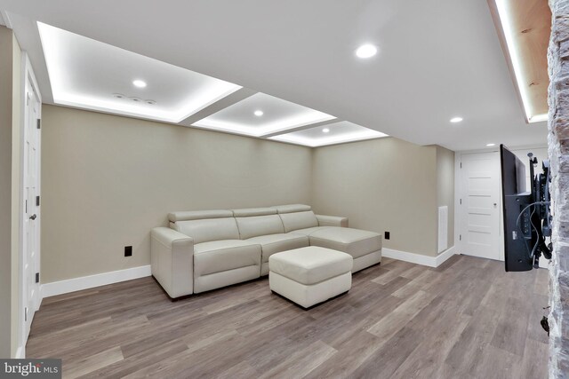 living room with light hardwood / wood-style floors