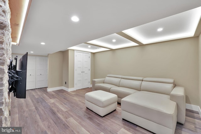 living room with light hardwood / wood-style flooring