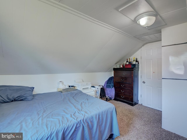 carpeted bedroom with lofted ceiling