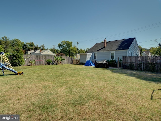 view of yard featuring a playground