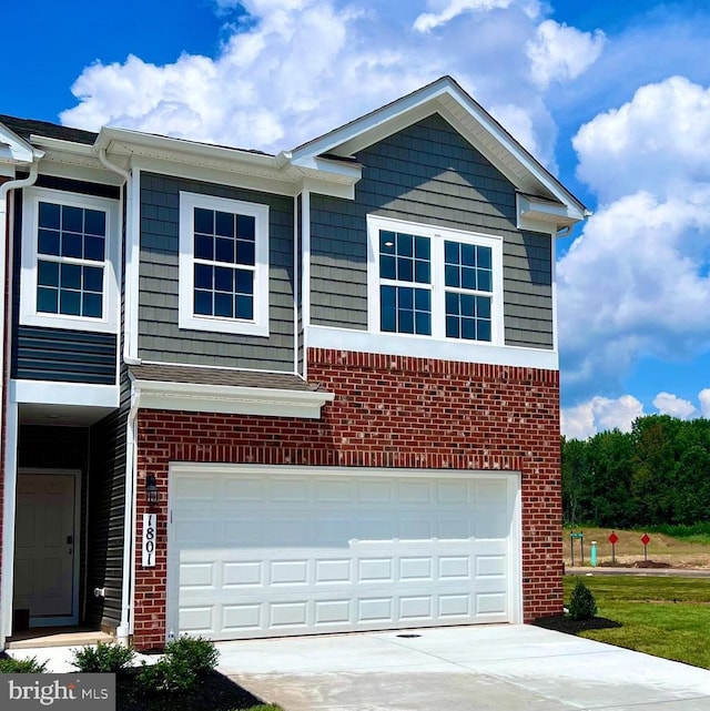 view of side of property with a garage