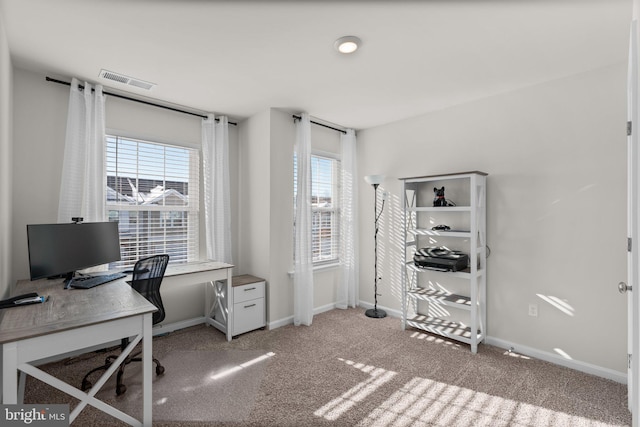 home office featuring light colored carpet