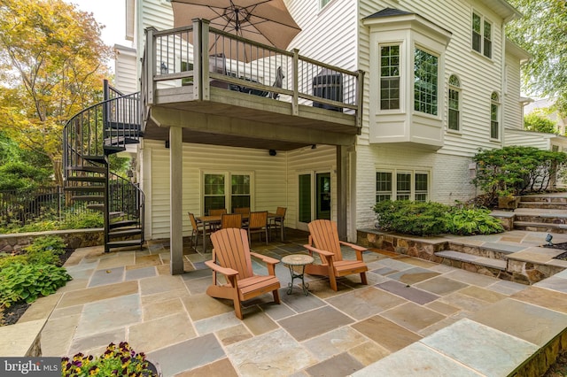 back of house with a patio area