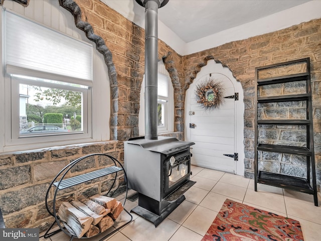 interior details featuring a wood stove