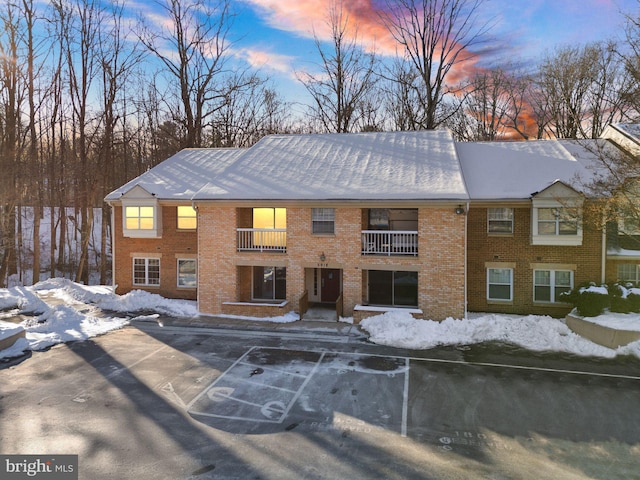 view of snow covered property