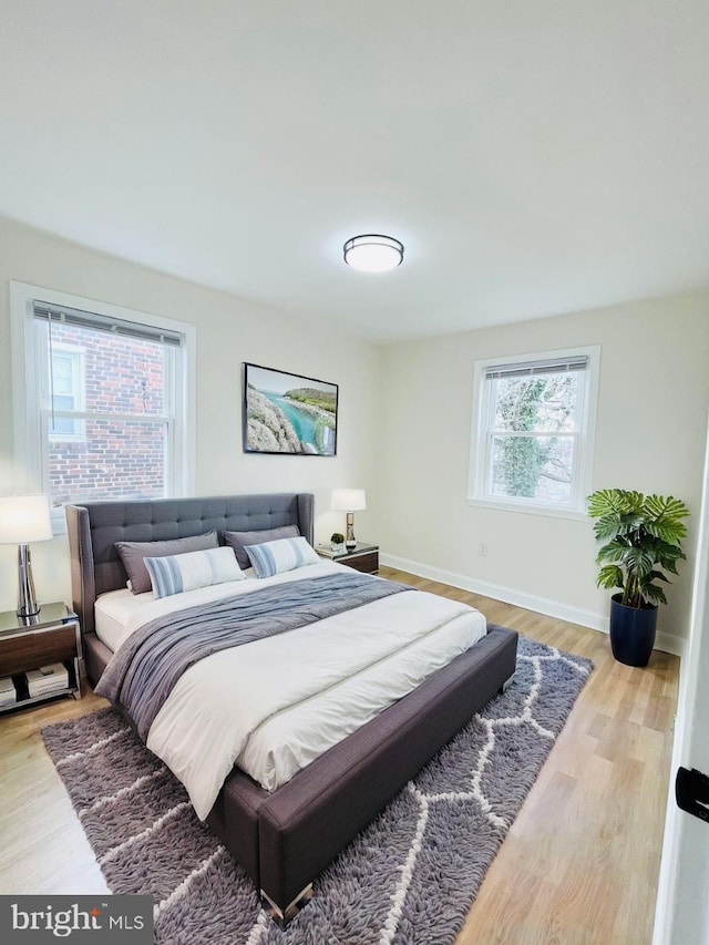 bedroom featuring light hardwood / wood-style flooring