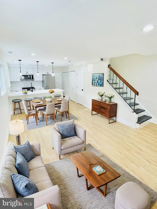 living room featuring light wood-type flooring