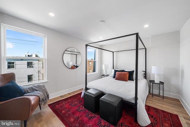 bedroom featuring wood-type flooring