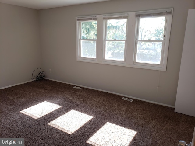 spare room with carpet flooring