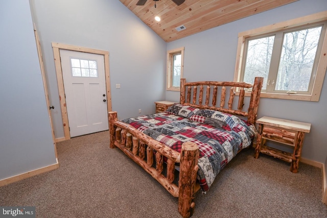 bedroom featuring multiple windows, ceiling fan, carpet floors, and vaulted ceiling