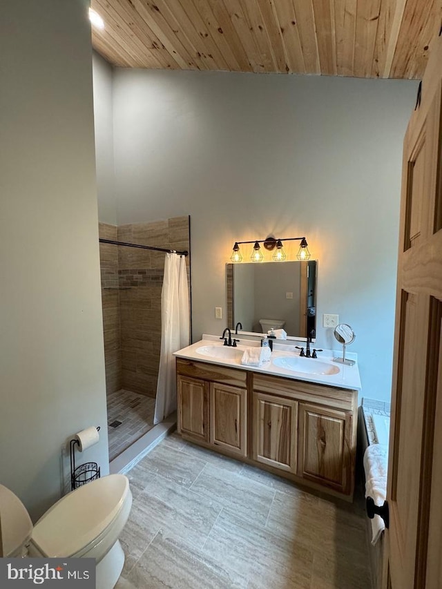 bathroom featuring vanity, toilet, wooden ceiling, and walk in shower