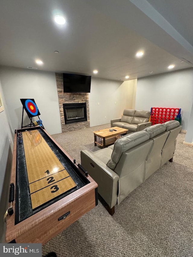 carpeted living room featuring a fireplace