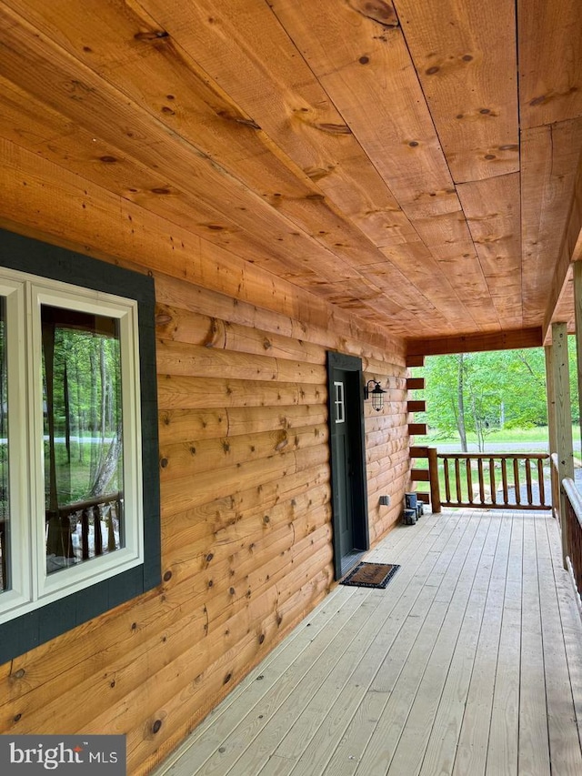 wooden deck featuring a porch