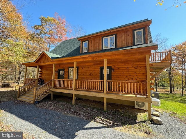 view of front of home featuring covered porch