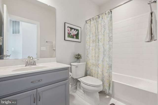 full bathroom featuring shower / bathtub combination with curtain, vanity, tile patterned flooring, and toilet