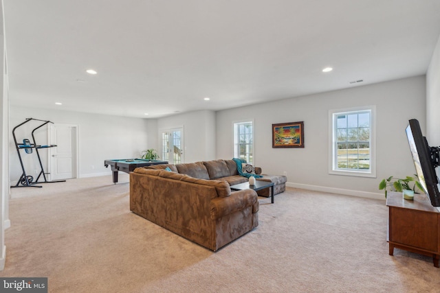 carpeted living room featuring pool table