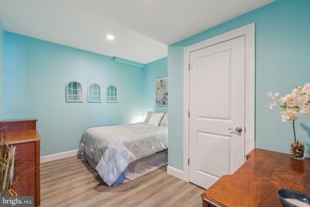 bedroom featuring light wood-type flooring