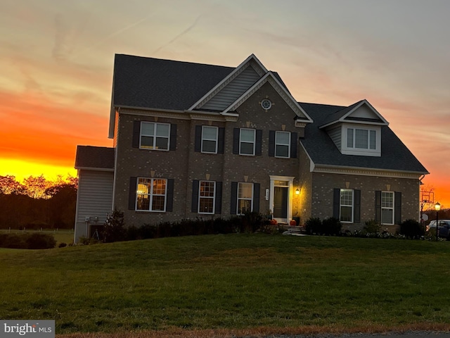 view of front of house featuring a yard