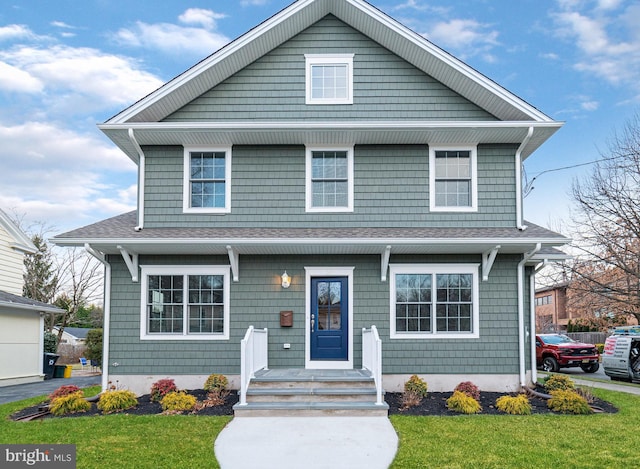 front of property with a front lawn