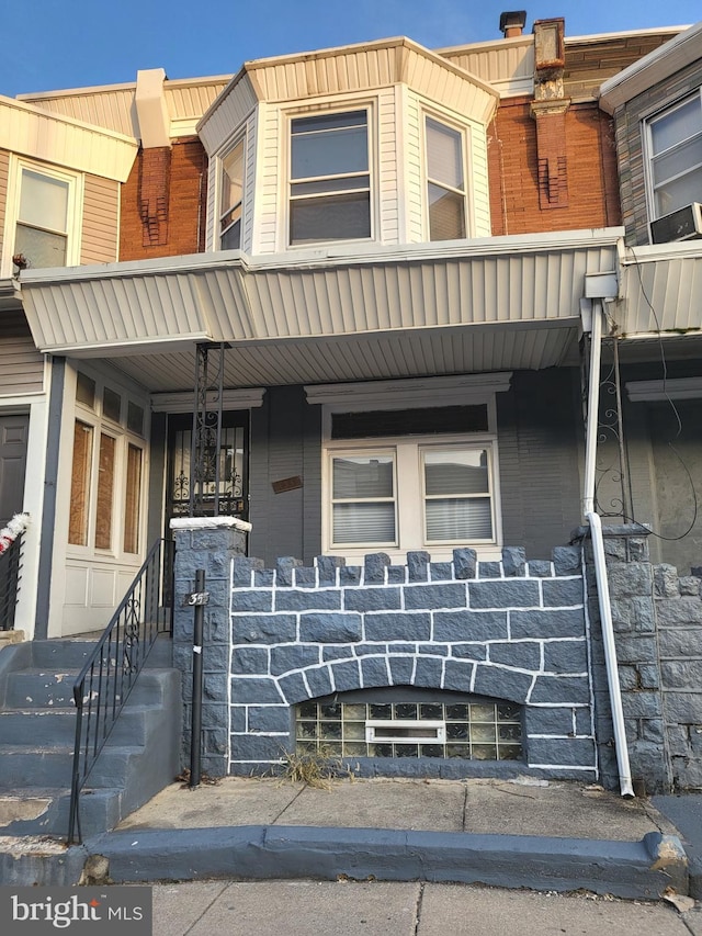 view of front of home featuring covered porch