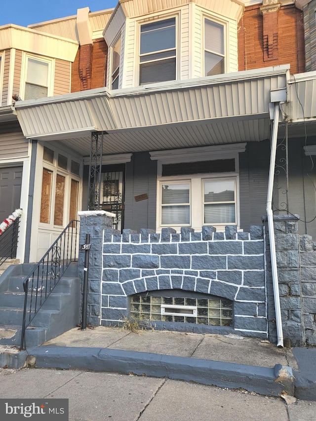 view of front of house with covered porch