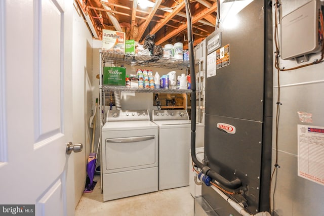 clothes washing area with heating unit and independent washer and dryer