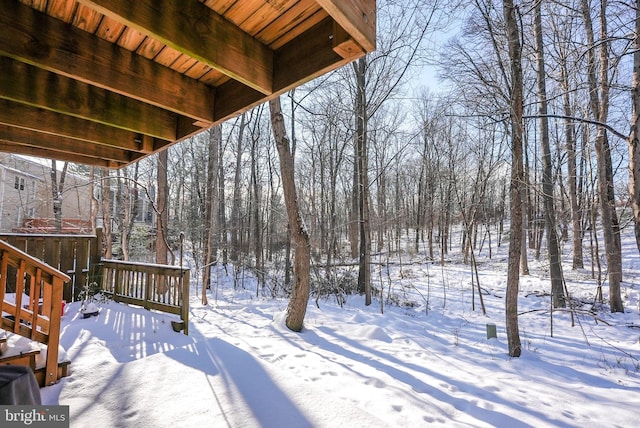 view of snow covered deck