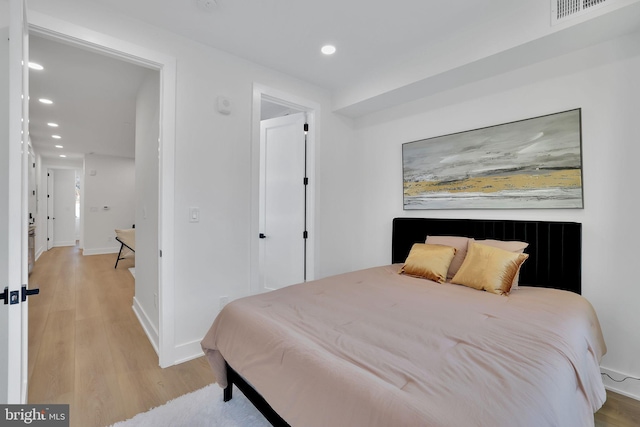 bedroom featuring light hardwood / wood-style flooring