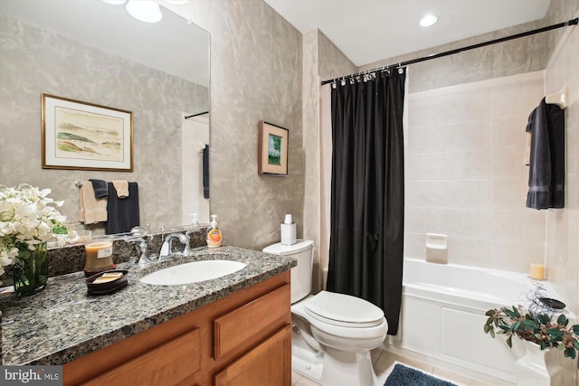 full bathroom featuring vanity, toilet, and shower / tub combo with curtain