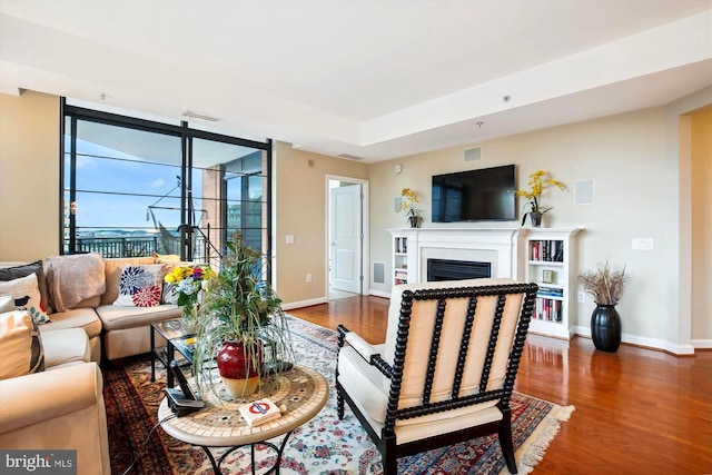 living room with wood-type flooring