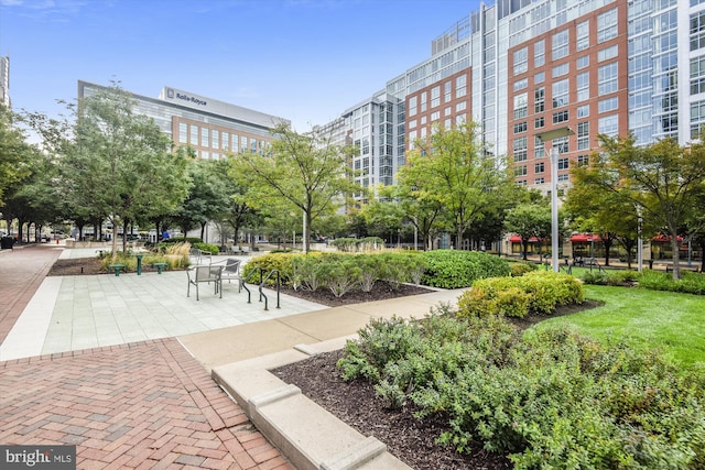 view of home's community with a patio area