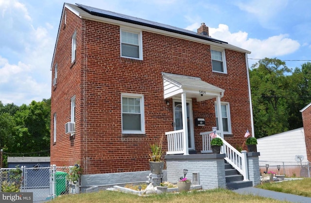 view of front of property with cooling unit