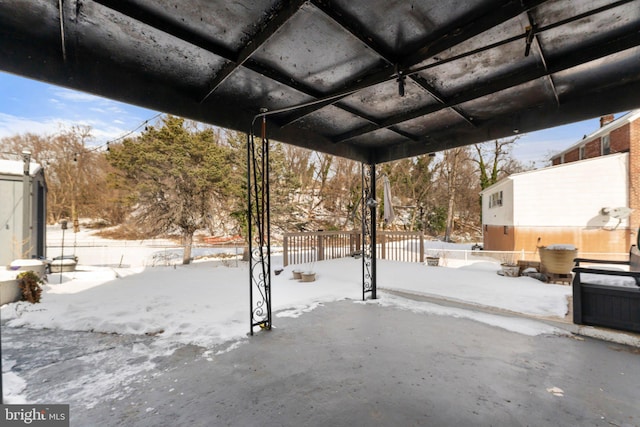 view of snow covered patio