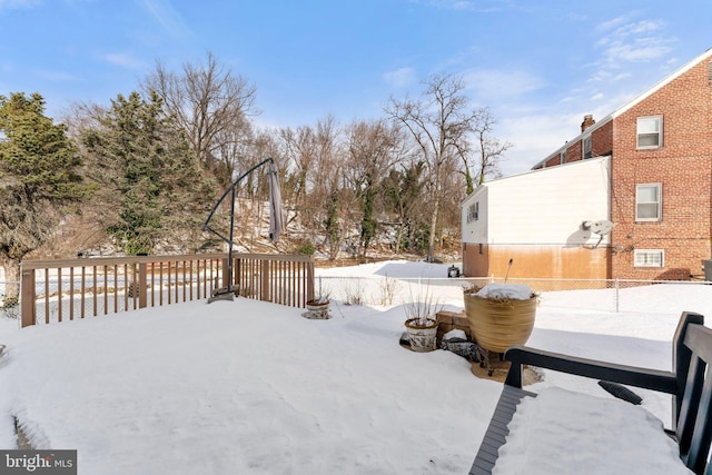 view of yard covered in snow