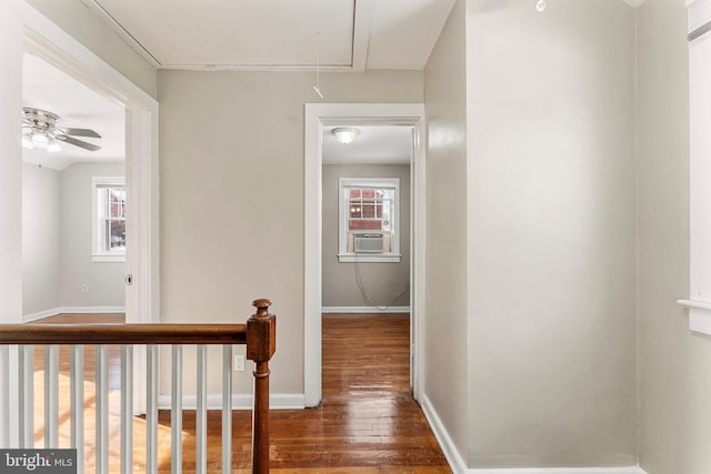 hallway with cooling unit and dark wood-type flooring