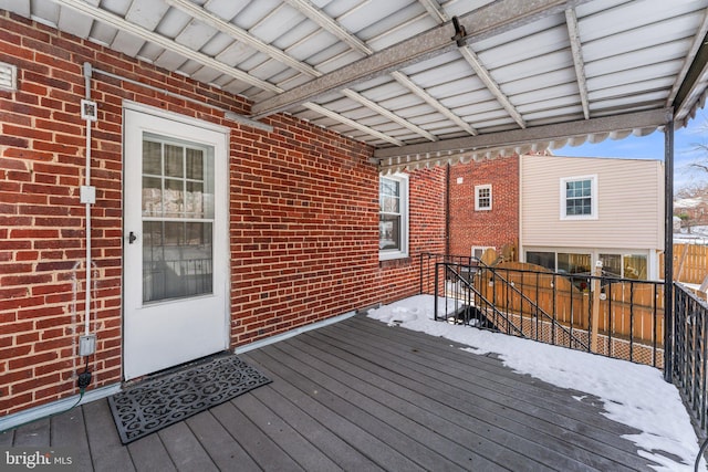 view of snow covered deck