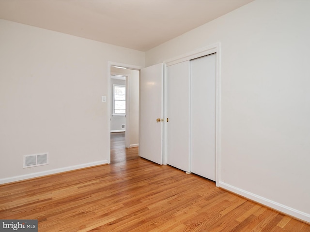 unfurnished bedroom with light hardwood / wood-style flooring