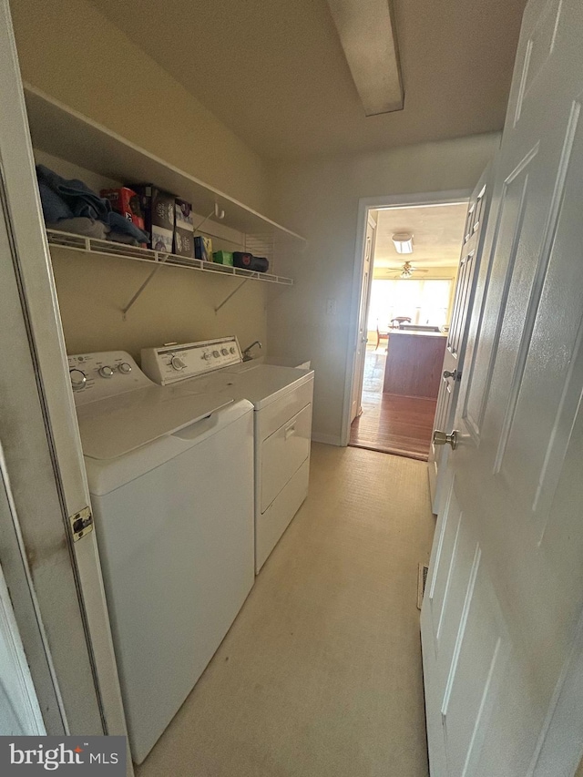 laundry area featuring independent washer and dryer